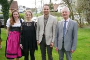 Vier Personen stehn nebeneinander zur Kamera
