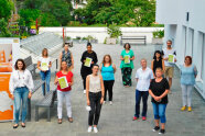 Gruppenfoto der Coaching-Teilnehmer im Außenbereich eines Gebäudes